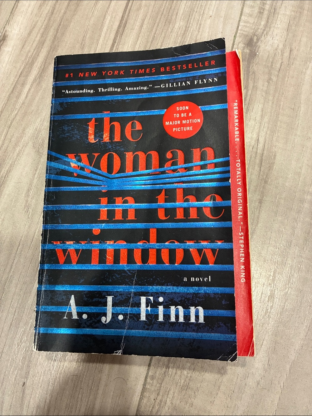 The Woman in the Window by A. J. Finn — Black & Red Paperback